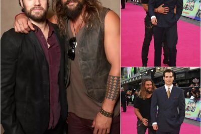 A moment so adorable the entire world rewound it five times—and no one believed it was real! Henry Cavill was keeping his serious, “cold Superman” look on the red carpet when suddenly Jason Momoa—real-life Aquaman—showed up like a DC-style ambush and wrapped him tightly from behind! 👉 But the peak moment was when Henry turned, looked straight at Momoa, and whispered something that left everyone frozen before social media exploded in shock and excitement. That moment became the very first spark of DC’s legendary bromance.