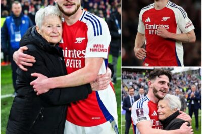 After the match against Everton, amid the bright stadium lights and the endless applause, Declan Rice created a moment that made millions of hearts hold their breath. He did not seek out the cameras or celebrate the victory, but instead quietly stepped forward to embrace an 80-year-old woman — someone who had once worked for his family and had silently supported him for many years, like a member of the family.