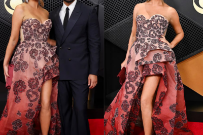 Chrissy Teigen dazzles in a strapless gown with daring thigh-high slit as she enjoys date night with husband John Legend at the Grammys after revealing she’s sober again