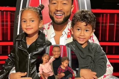 That’s enough Dad: John Legend brings his two adorable kids on set of The Voice. The two toddlers sat relaxed in their father’s arms as Luna adorably placed her tiny hand over Legend’s mouth.