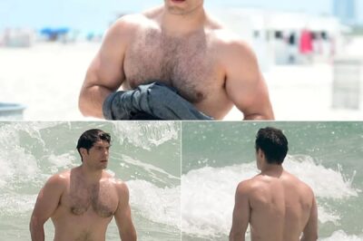 Superman hunk Henry Cavill shows off his super beach bod as he emerges from the sea