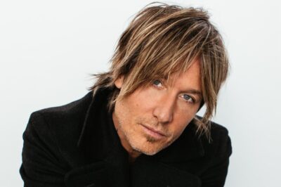 Keith Urban sought to escape from a reality filled with stress, conflict, division, instability, and even despair with his yacht rock album “Flow State”.